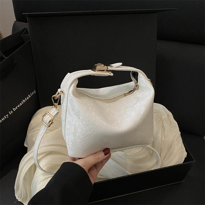 Damen Umhängetasche mit eleganter Schlangenprägung und praktischem Schulterriemen Nord Taschen
