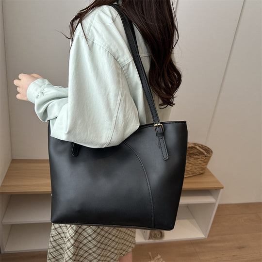 Damen elegante Handtasche mit asymmetrischem Design und robusten Trageriemen Nord Taschen