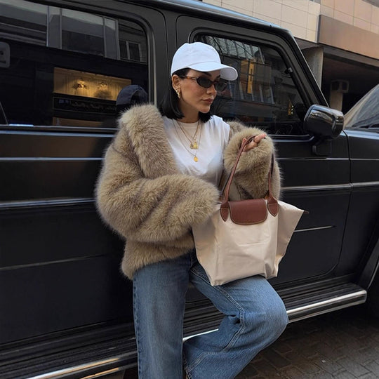 Damen Boxy-Kunstpelzjacke im Teddy-Look mit Oversize-Schalkragen Nord Taschen
