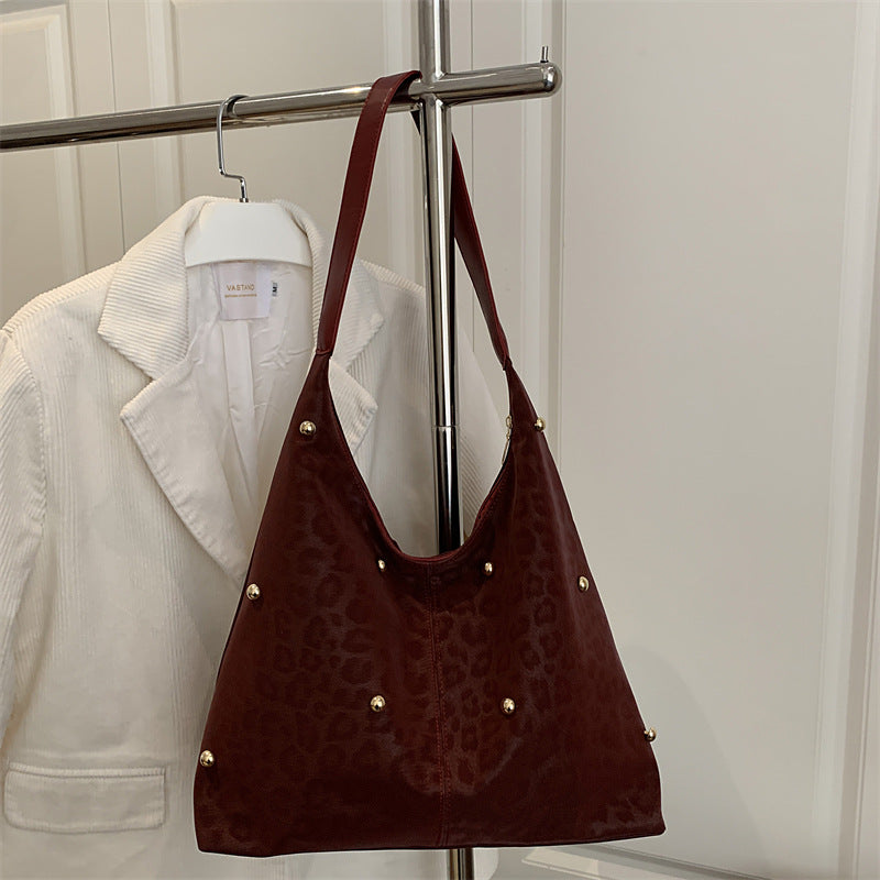 Damen Hobo-Tasche mit elegantem Leopardenmuster und goldenen Akzenten Nord Taschen