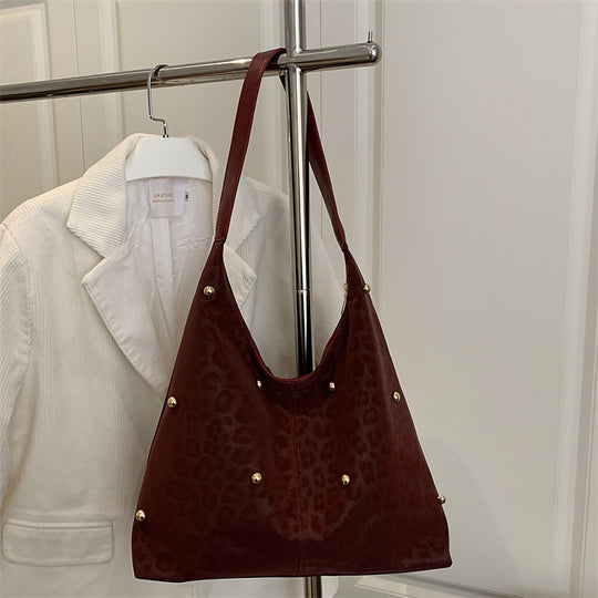 Damen Hobo-Tasche mit elegantem Leopardenmuster und goldenen Akzenten Nord Taschen