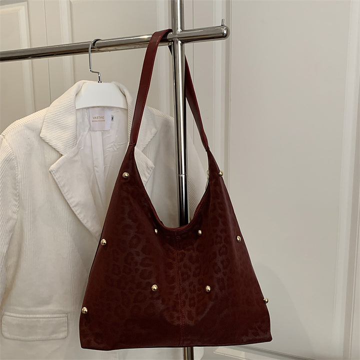Damen Hobo-Tasche mit elegantem Leopardenmuster und goldenen Akzenten Nord Taschen