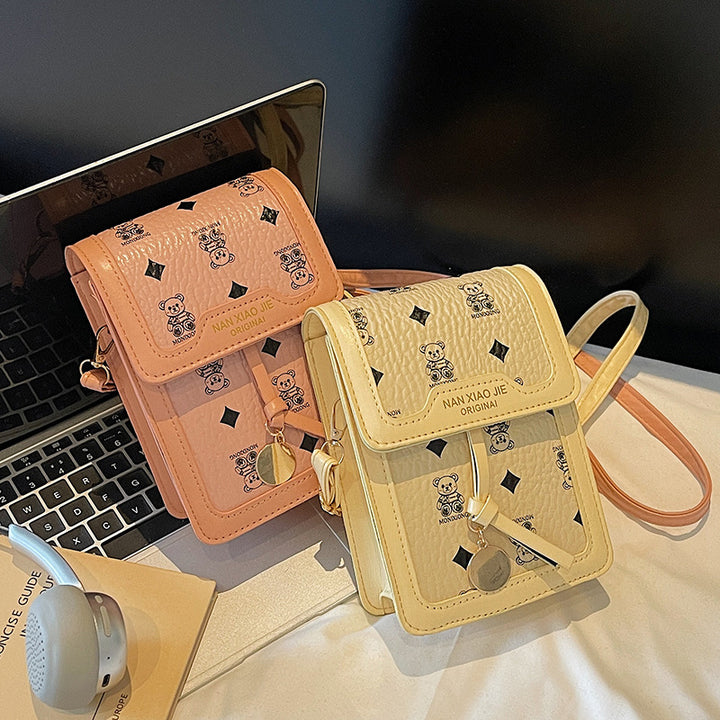 Damen Umhängetasche mit strukturiertem Design und dekorativen Details Nord Taschen