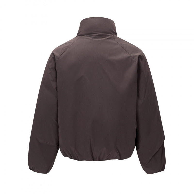Unisex Kurz geschnittene leichte Windjacke im Boxy-Cut mit hohem Stehkragen und elastischem Saum Nord Taschen