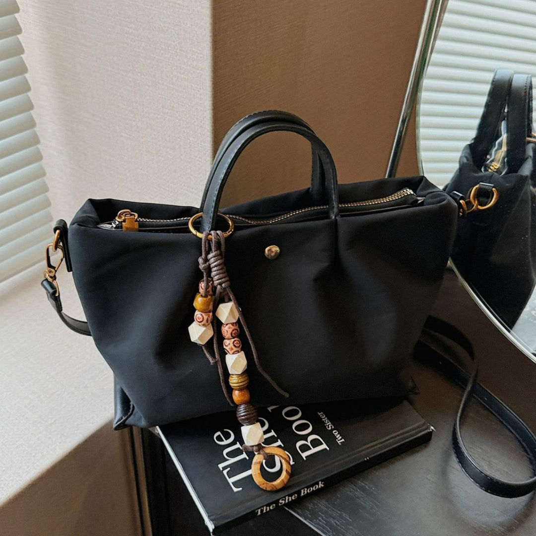 Damen elegante Umhängetasche mit charmantem Dekor Nord Taschen