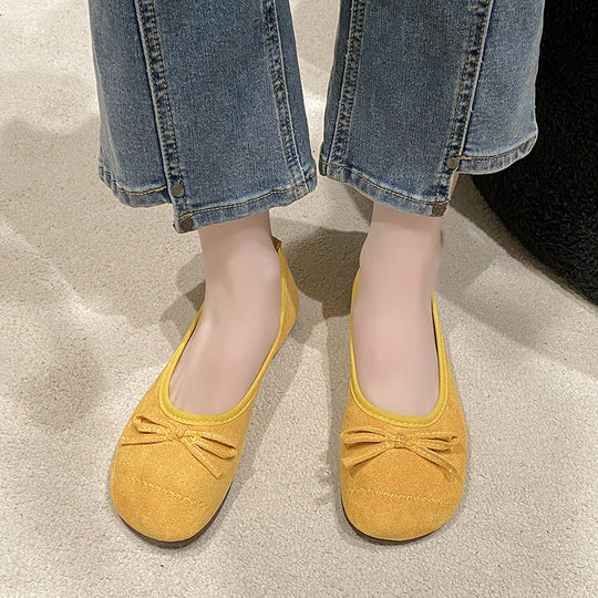 Damen Ballerina-Schuhe mit zierlichem Schleifenakzent und eleganter Oberfläche