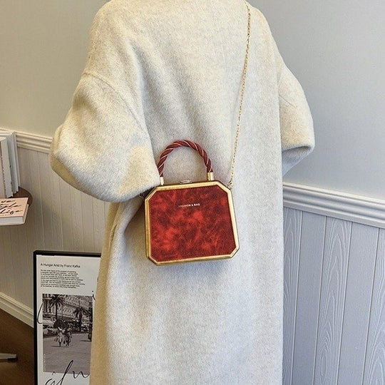 Damen elegante Handtasche im geometrischen Design mit goldenen Akzenten Nord Taschen