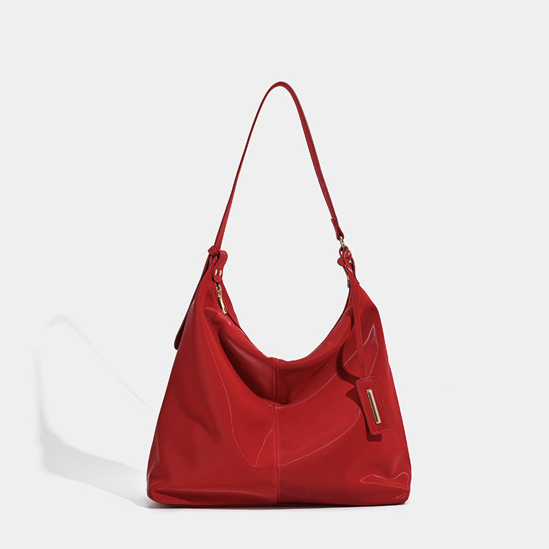 Damen Hobo-Tasche mit glänzender Oberfläche und elegantem Design Nord Taschen