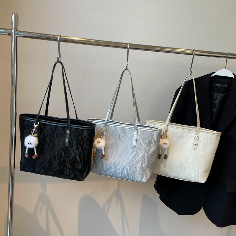 Damen-Handtasche mit hochwertiger Textur und verspieltem Charme Nord Taschen