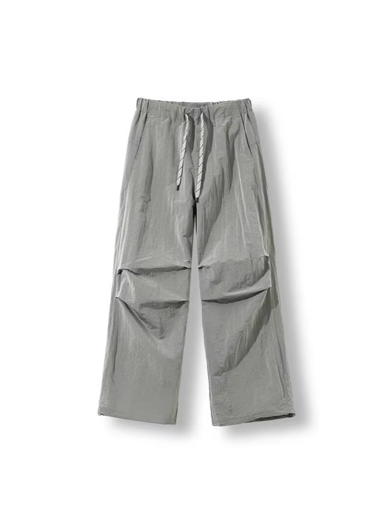 Herren Locker geschnittene Nylon-Trackpants mit Kordelzug, aufgesetzten Taschen und gerader Wide‑Leg-Passform Nord Taschen