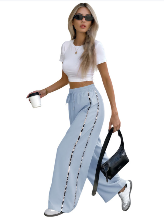 Damen Weite High‑Waist Loungehose mit Kordelzug und kontrastierenden Seitenstreifen Nord Taschen