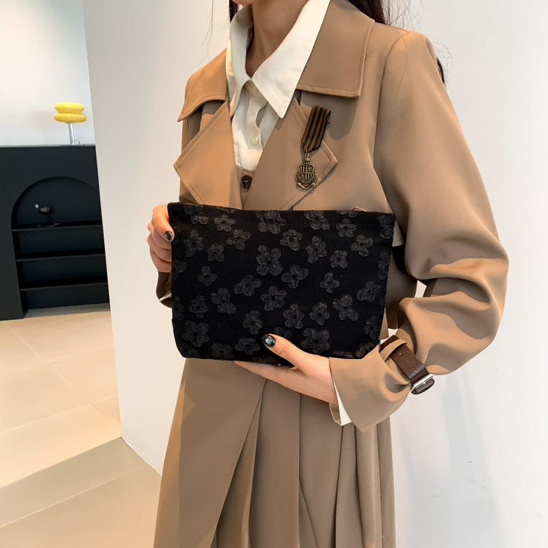 Damen Clutch-Tasche mit floralem Design und hochwertiger Textur Nord Taschen