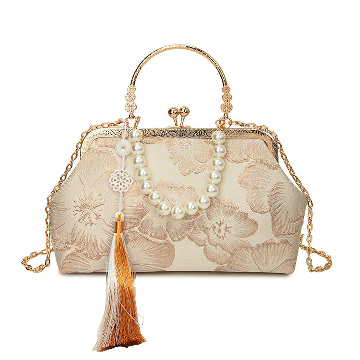 Damen elegante Abendtasche mit floralem Design und attraktiver Kettenakzent Nord Taschen