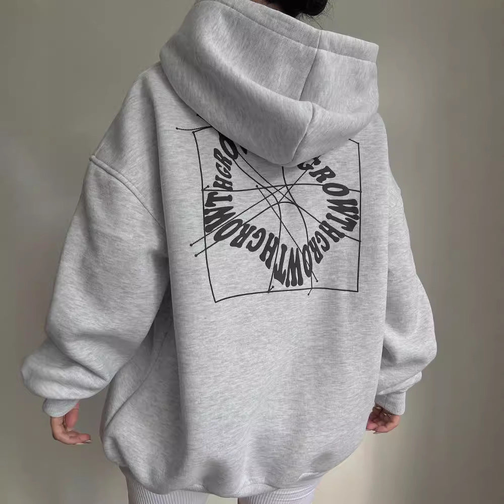 Damen Oversize Kapuzenpullover mit Grafikprint auf dem Rücken Nord Taschen