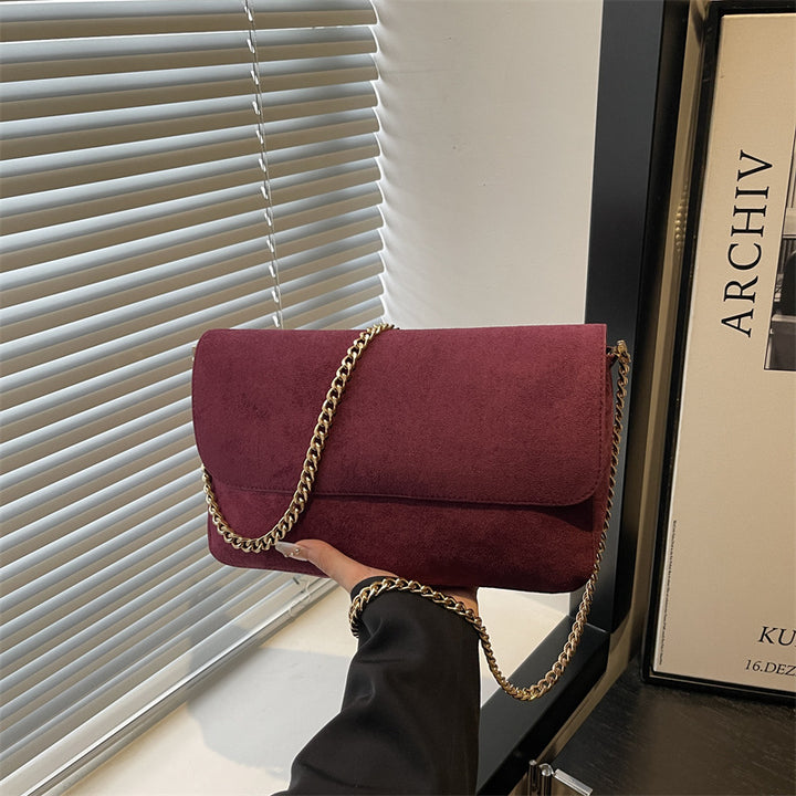Damen Clutch Tasche mit edlem Kettenakzent Nord Taschen