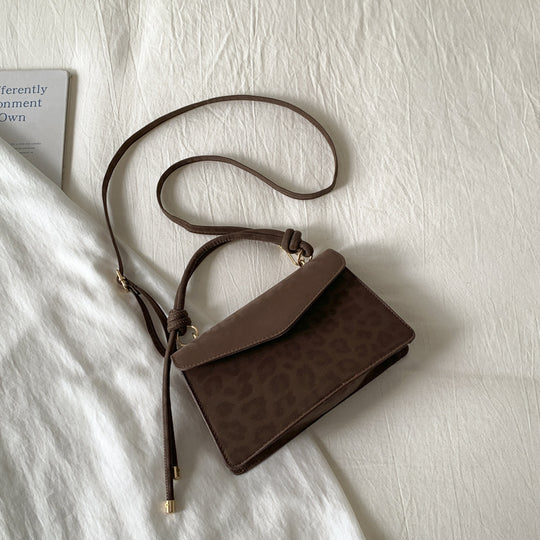 Damen Umhängetasche mit eleganter Leo-Prägung und abnehmbarem Schulterriemen Nord Taschen