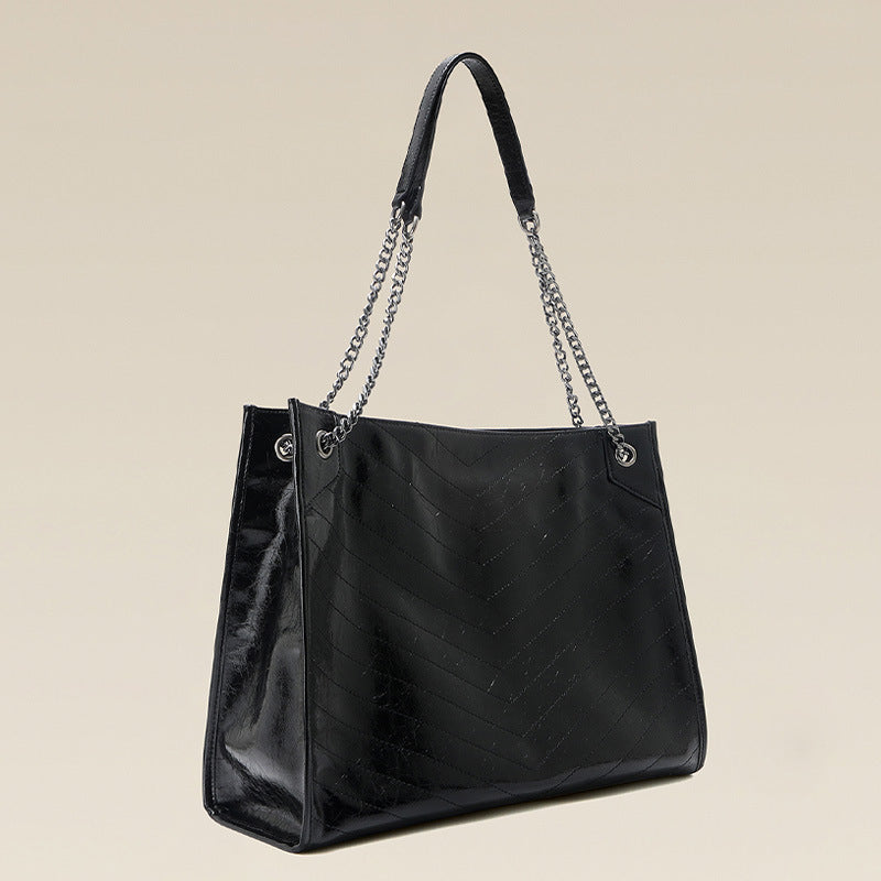 Damen Tote Bag aus glänzendem Kunstleder mit gestepptem Muster Nord Taschen
