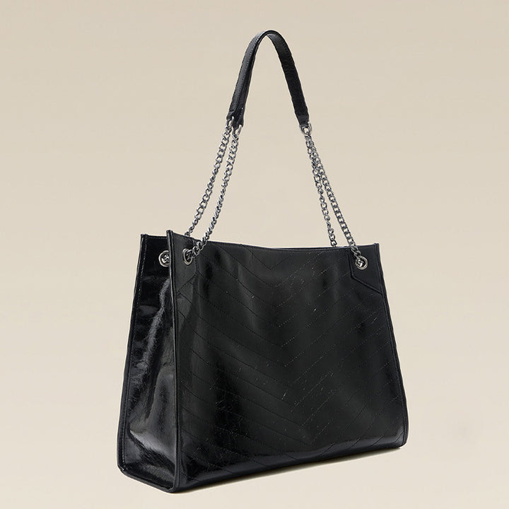Damen Tote Bag aus glänzendem Kunstleder mit gestepptem Muster Nord Taschen