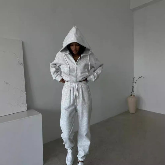 Damen lässiges Kapuzen-Sweatshirt und Jogginghose Set in Oversize-Passform mit Reißverschluss und Kängurutasche Nord Taschen