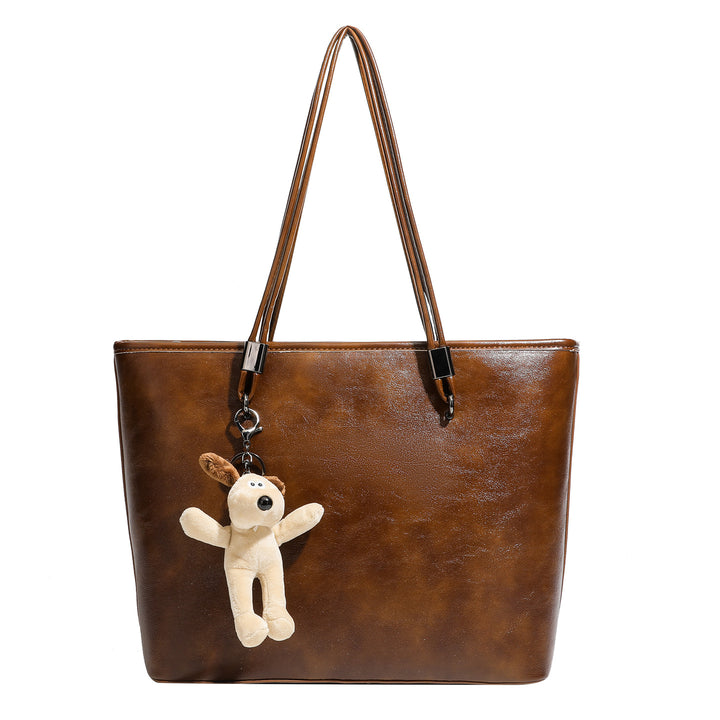 Damen Shopper-Tasche aus hochwertigem Kunstleder mit verspieltem Anhänger Nord Taschen