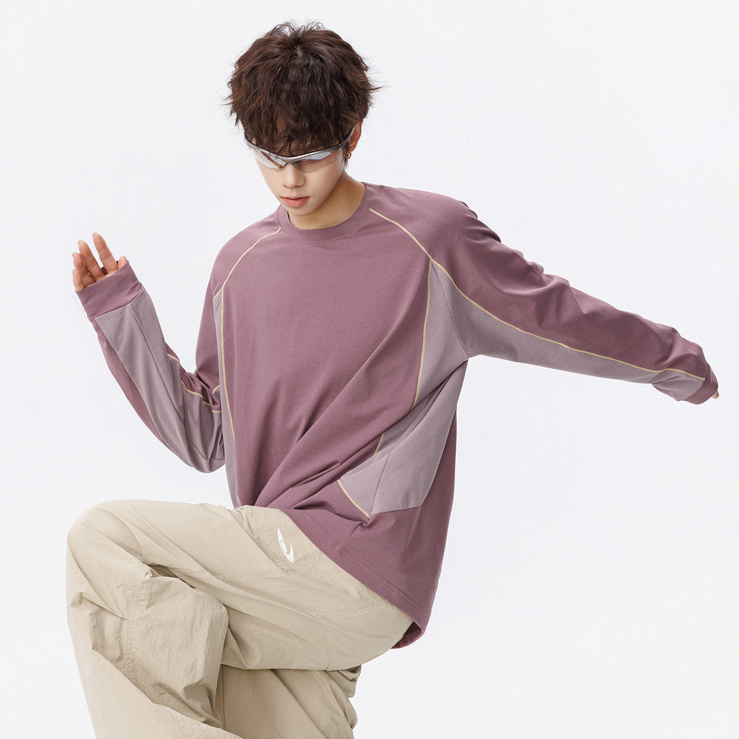 Damen Oversize-Langarmshirt mit Raglanärmeln, atmungsaktiven Seiteneinsätzen und Rundhalsausschnitt Nord Taschen