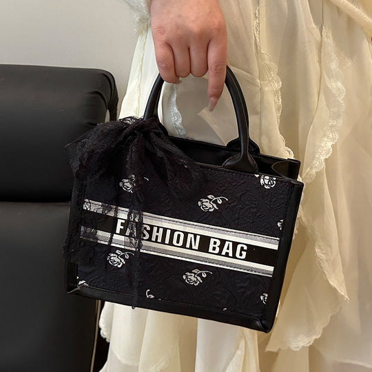 Damen modische Umhängetasche mit floralem Relief und verspieltem Schleifendetail Nord Taschen