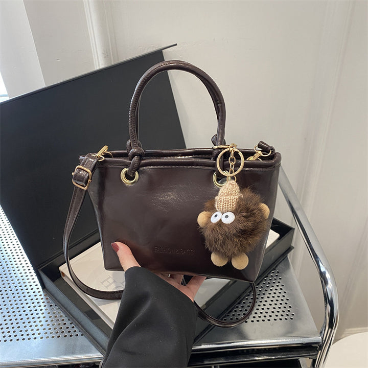 Damen modische Handtasche mit charmantem Anhänger und hochwertiger Verarbeitung Nord Taschen