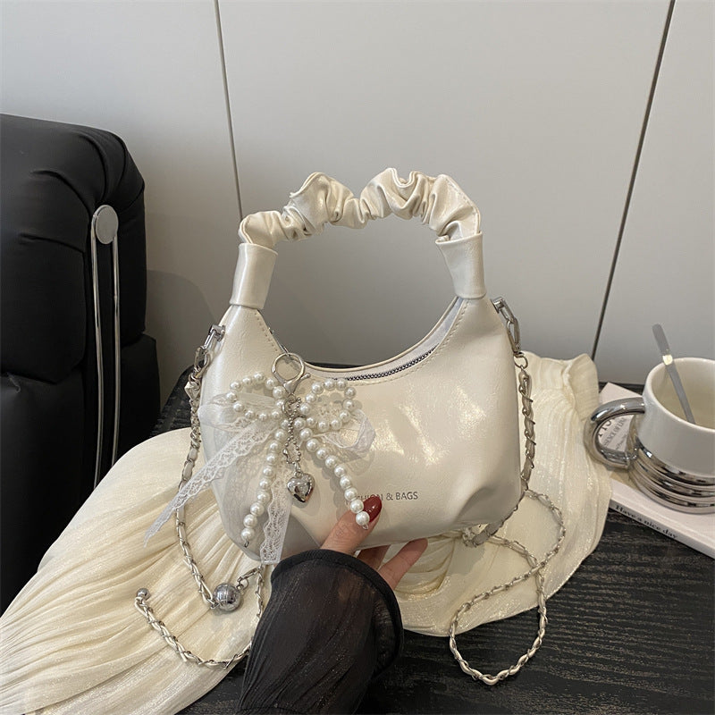 Damen elegante Handtasche mit dekorativen Perlenakzenten Nord Taschen