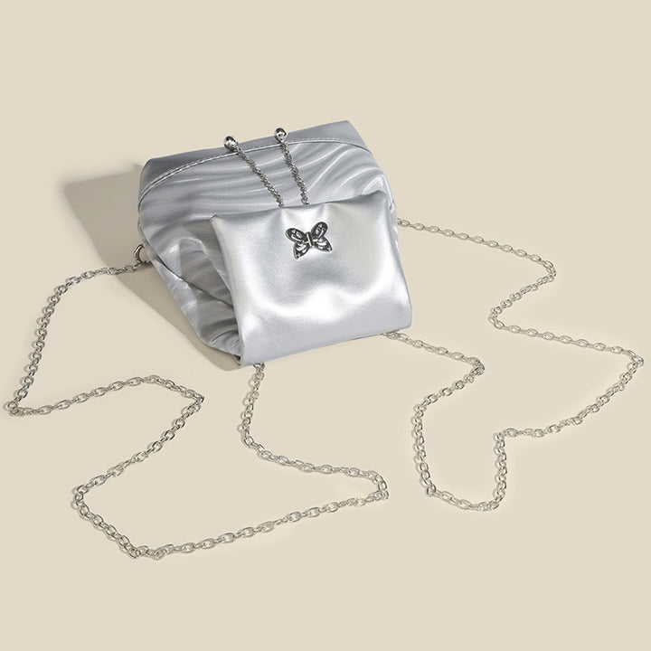 Damen Rucksackhandtasche mit verspieltem Schmetterlingsverschluss und eleganter Oberflächenstruktur Nord Taschen
