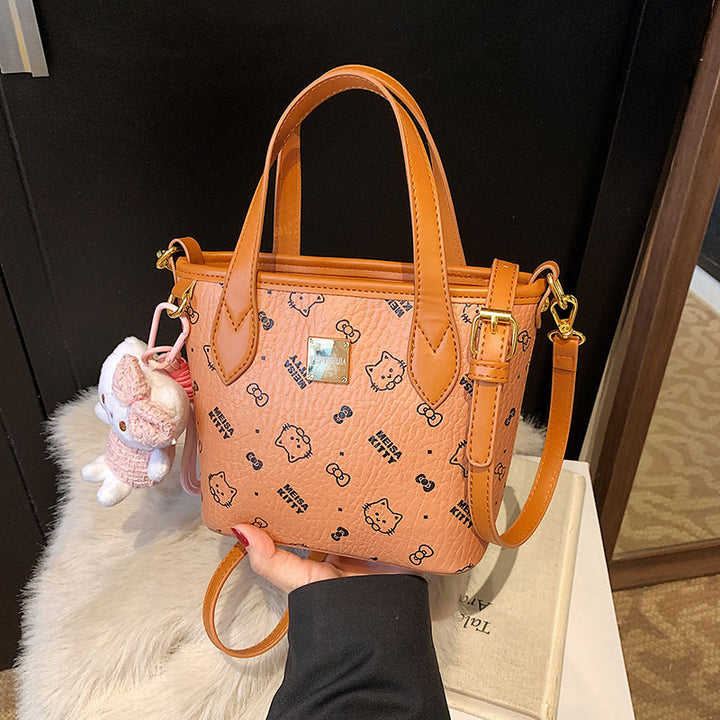 Damen Mini-Handtasche im entzückenden Design mit abnehmbarem Anhänger | Nord Taschen
