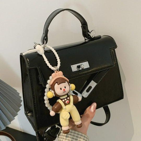 Damen Mini Handtasche mit süßem Anhänger Nord Taschen