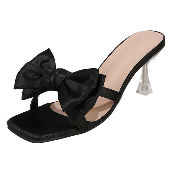 Damen High Heel Pantoletten mit eleganter Schleifen-Applikation und glitzerndem Absatz