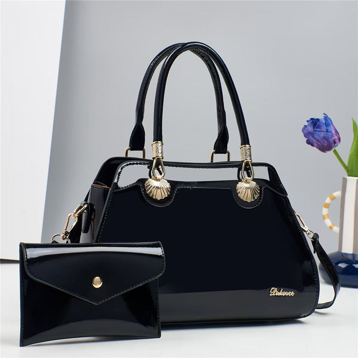 Damen Handtasche mit eleganten Goldakzenten und abnehmbarer Mini-Clutch Nord Taschen