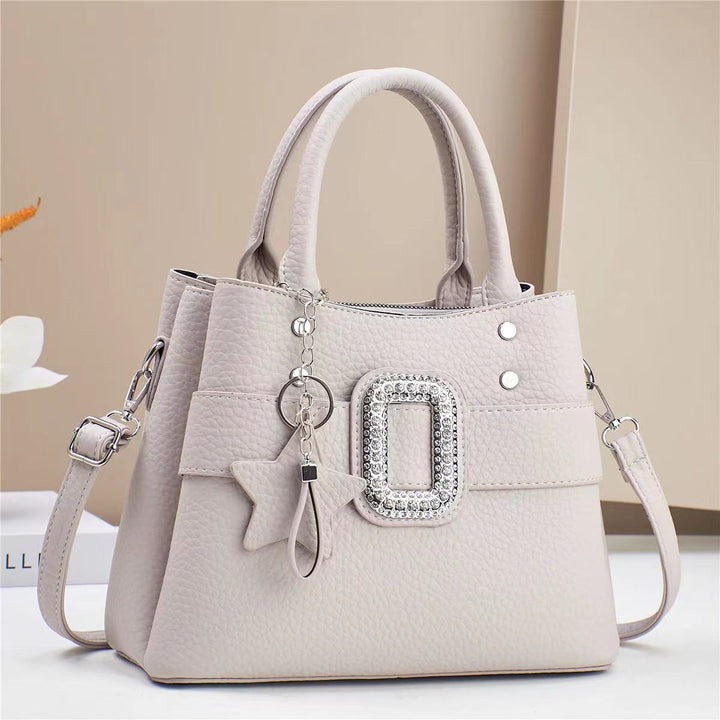 Damen Designer-Umhängetasche mit trendy Schmuckdetails und abnehmbarem Schulterriemen Nord Taschen