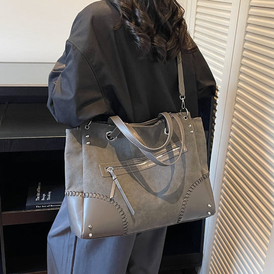 Damen elegante Handtasche mit offenen Seiten und dezenten Lederdetails Nord Taschen