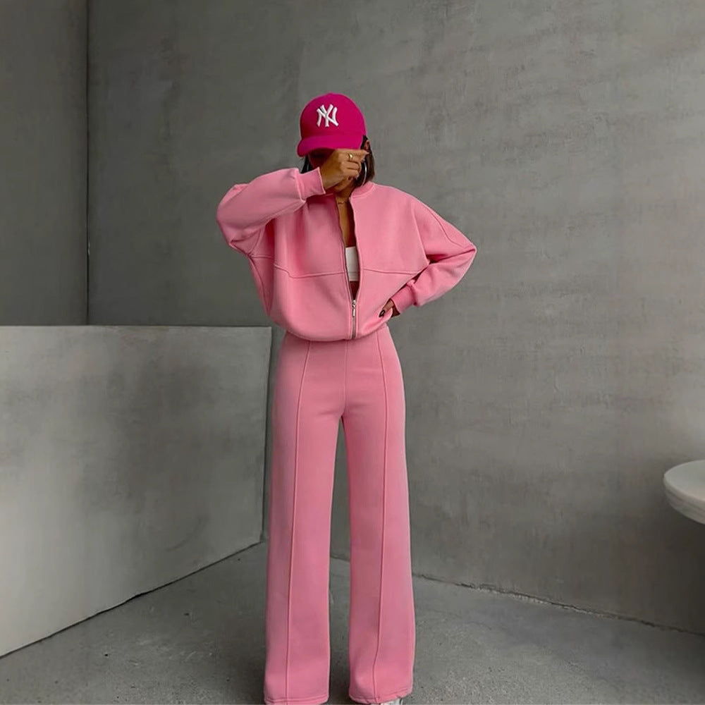Damen sportive Oversize-Fleecejacke mit diagonaler Reißverschluss-Optik und weit geschnittener High-Waist-Jogginghose Nord Taschen