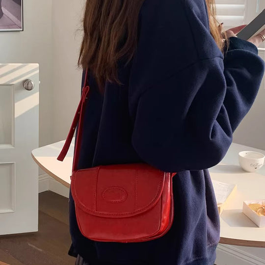 Damen Crossbody-Tasche mit eleganter Klappenöffnung und hochwertiger Lederstruktur Nord Taschen