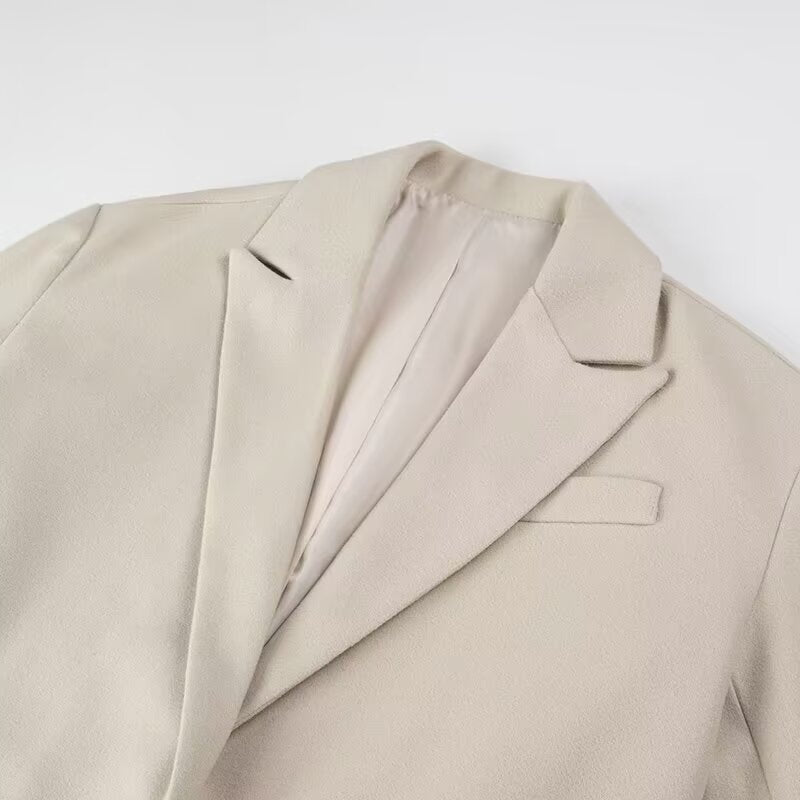 Damen Langmantel mit langem Fransen‑Saum, kastiger Oversize‑Silhouette und Reverskragen Nord Taschen
