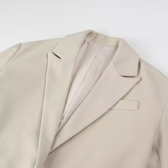 Damen Langmantel mit langem Fransen‑Saum, kastiger Oversize‑Silhouette und Reverskragen Nord Taschen