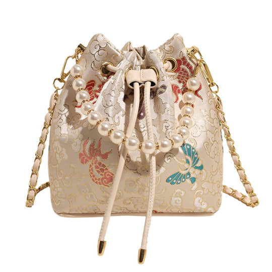 Damen Umhängetasche mit luxuriösem Perlenbesatz und floralen Details Nord Taschen
