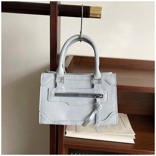 Damen stilvolle Handtasche mit dekorativem Reißverschluss Nord Taschen