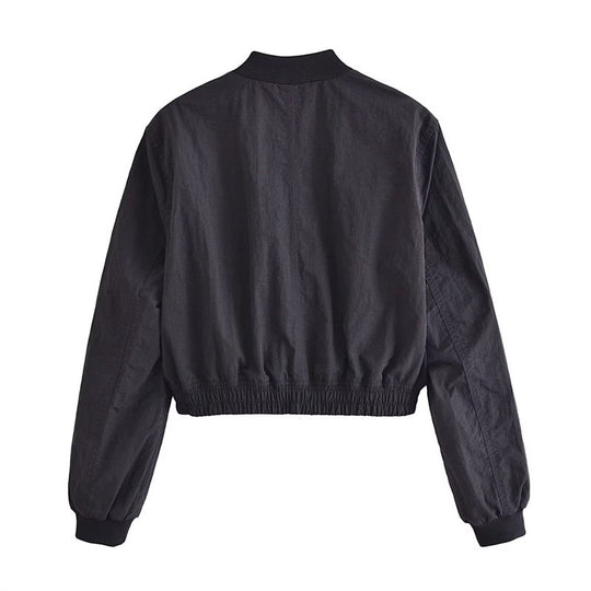 Damen Kurze Cropped-Bomberjacke aus leichtem Windbreaker‑Material mit Rippbündchen und seitlichen Einschubtaschen Nord Taschen