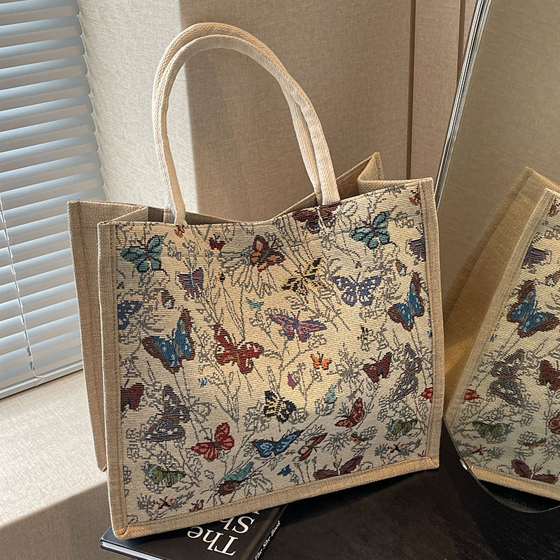 Damen Jute-Tragetasche mit floralen Schmetterlingsmotiven Nord Taschen