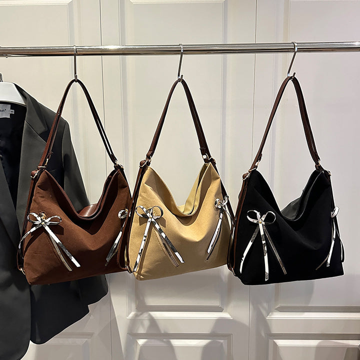 Damen Hobo-Tasche mit verspielten Schleifendetails und praktischen Fächern Nord Taschen