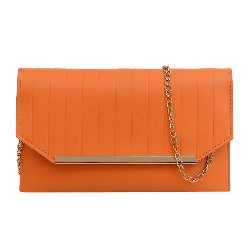 Damen elegante Clutch mit strukturiertem Design und goldenen Akzenten Nord Taschen