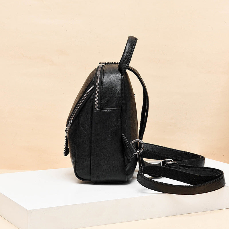 Damen Rucksackhandtasche mit kunstvollem Flechtmuster und praktischen Fächern Nord Taschen
