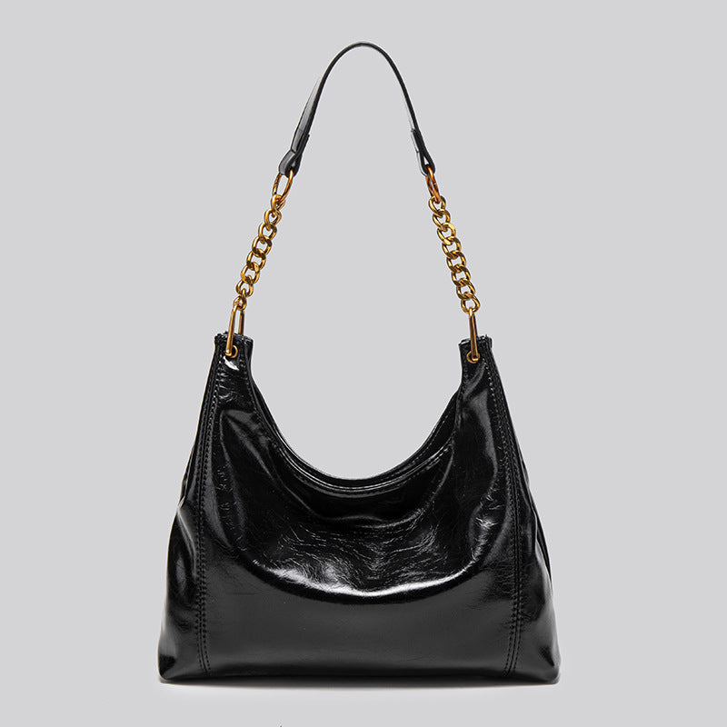 Damen Hobo-Tasche mit glänzender Oberfläche und dekorativem Kettenhenkel Nord Taschen