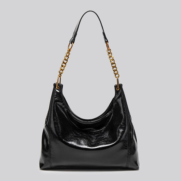 Damen Hobo-Tasche mit glänzender Oberfläche und dekorativem Kettenhenkel Nord Taschen