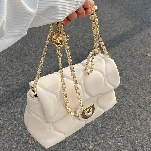 Damen Clutch-Tasche mit gepolstertem Design und goldenen Akzenten Nord Taschen