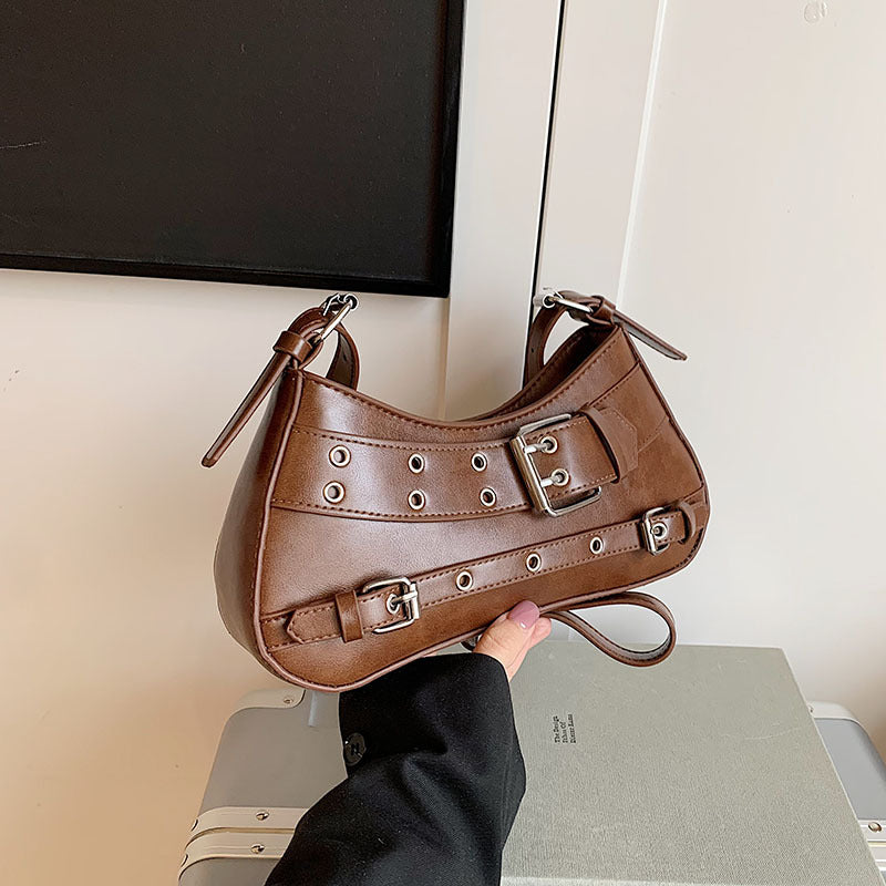 Damen Handtasche mit verstellbarem Trageriemen und dekorativen Schnallen Nord Taschen